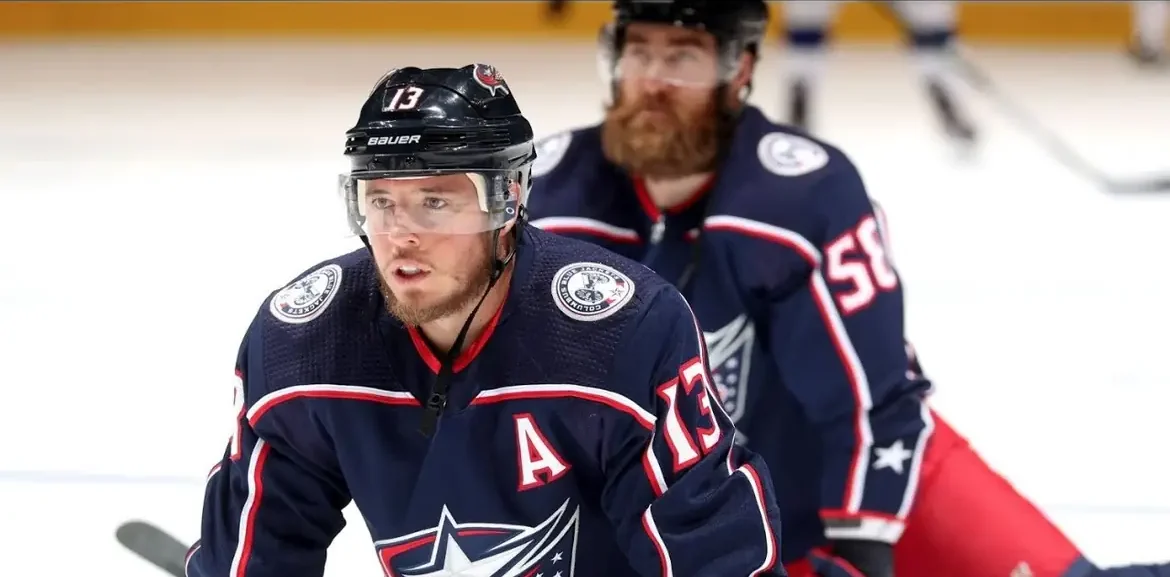 A Columbus Blue Jackets captain at center ice