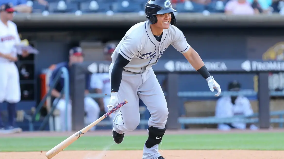 A Columbus Clippers hitter breaking out of the box