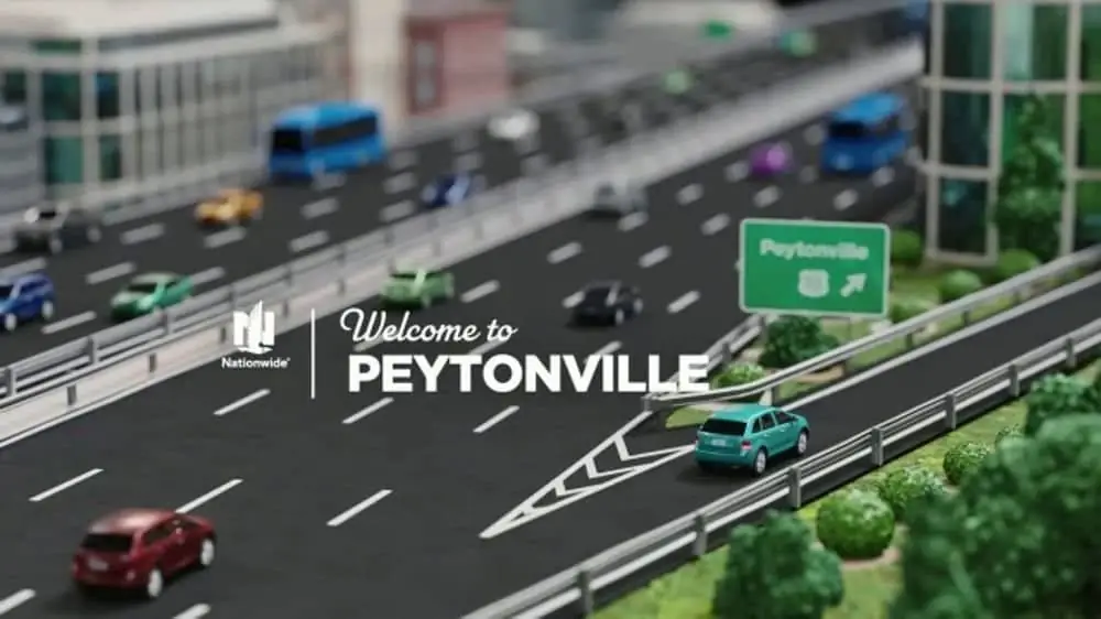 A Welcome to Peytonville end card over a model highway