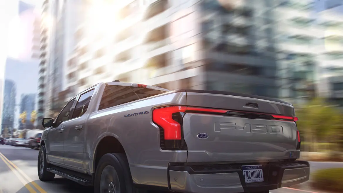An F-150 Lightning on a city street