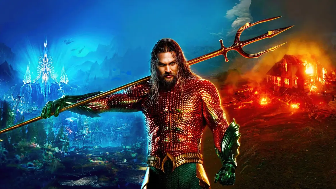 Aquaman with the trident over Atlantis and a burning shore