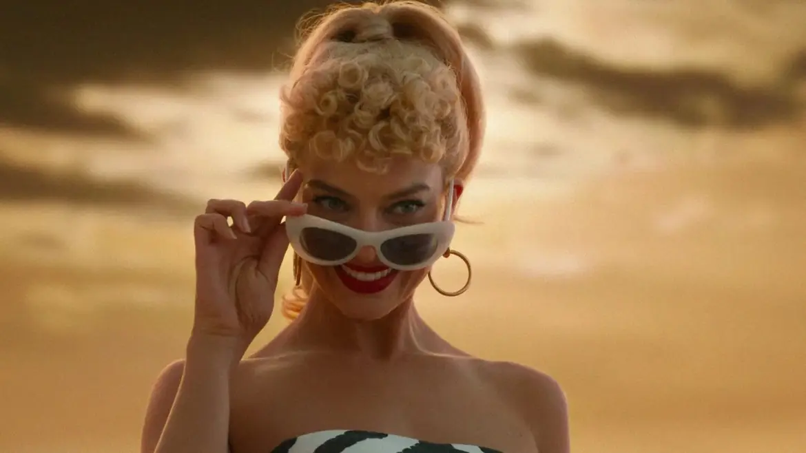 Barbie lowering her sunglasses