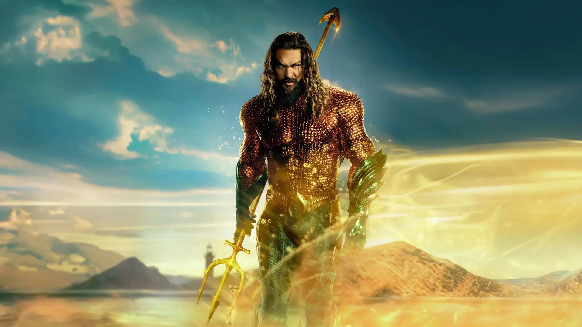 Aquaman holding a trident, standing against a cloudy sky and a desert landscape.