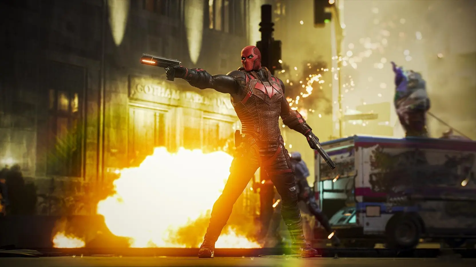 Red Hood firing through an explosion