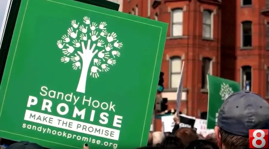 Sandy Hook Promise campaign sign at a rally